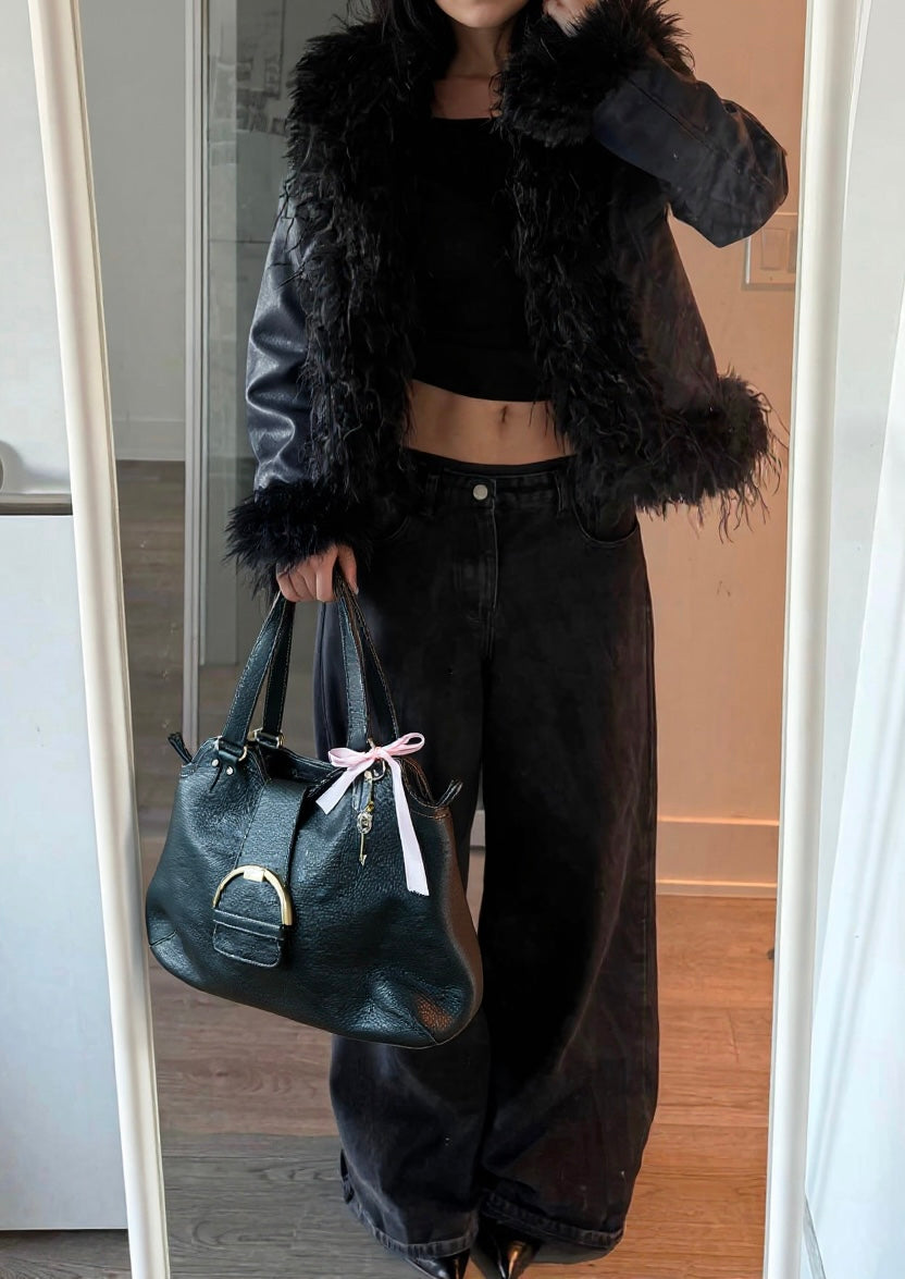 Vintage leather bag with Cats buckle